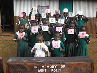 Compassion CBO Chidren form words In Memory of Aunt Polly